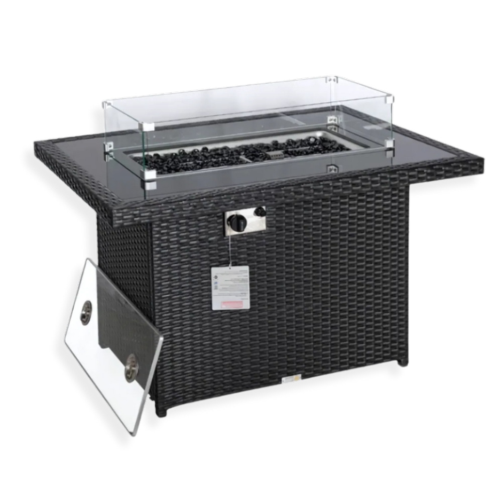 A black wicker fire table with a glass top and visible gas valve, set against a white background.