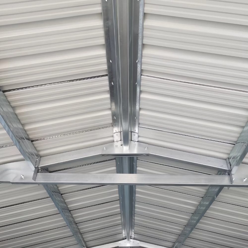Metal ceiling joist against a corrugated metal roof