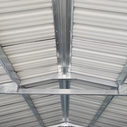 Metal ceiling joist against a corrugated metal roof