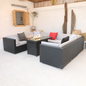 A U-shaped outdoor sectional sofa with handwoven PE rattan and a sturdy aluminum frame, featuring gray cushions and pillows, viewed from a slightly elevated angle.